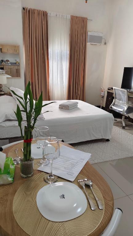 Кровать или кровати в номере San Marino Residences Condominium