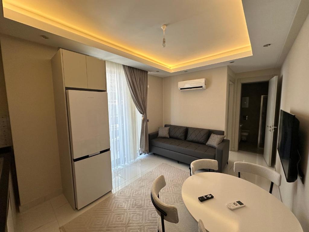 โทรทัศน์และ/หรือระบบความบันเทิงของ RUBİN Residence