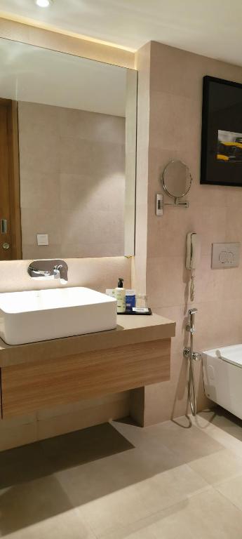 Koupelna v ubytování Royal Hometel Suites