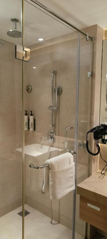 Koupelna v ubytování Royal Hometel Suites