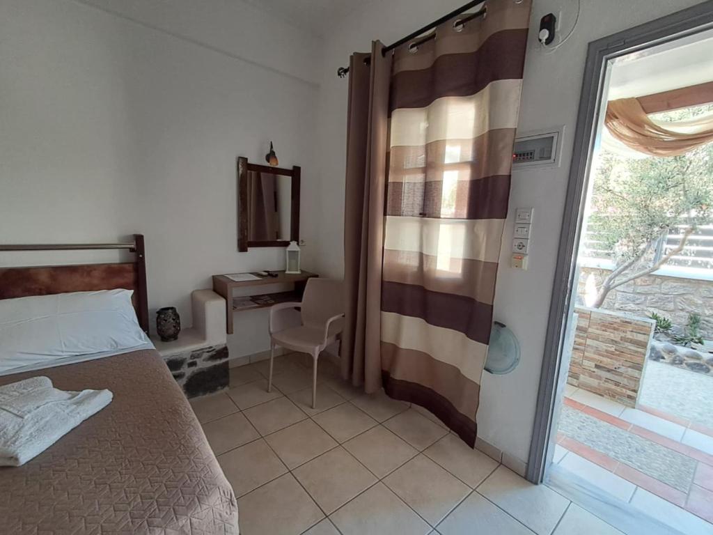 Letto o letti in una camera di Villa Nektaria