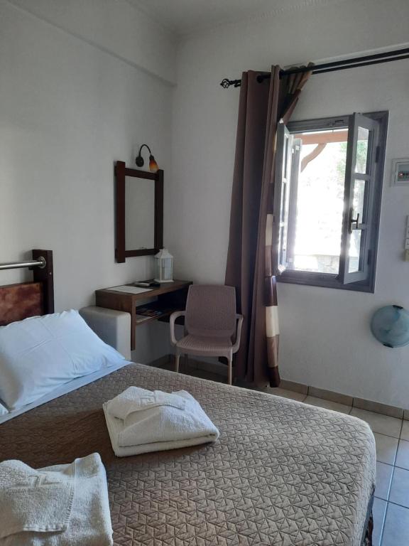 Letto o letti in una camera di Villa Nektaria