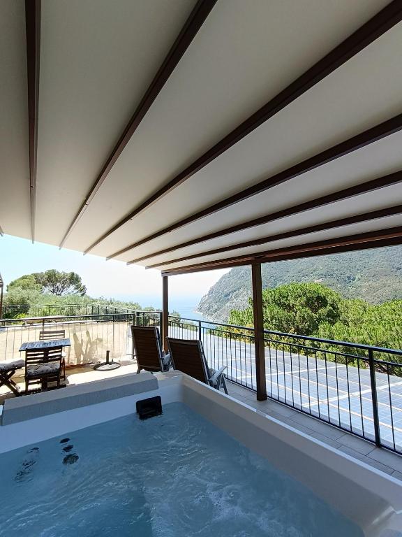 a swimming pool with a view of the ocean at La Cabana Cinque Terre Monterosso in Monterosso al Mare