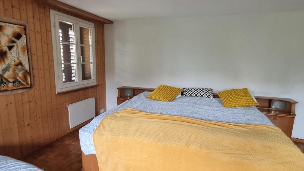 Postel nebo postele na pokoji v ubytování Ferienhaus Luzern