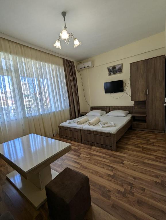 Postel nebo postele na pokoji v ubytování Hotel Captain