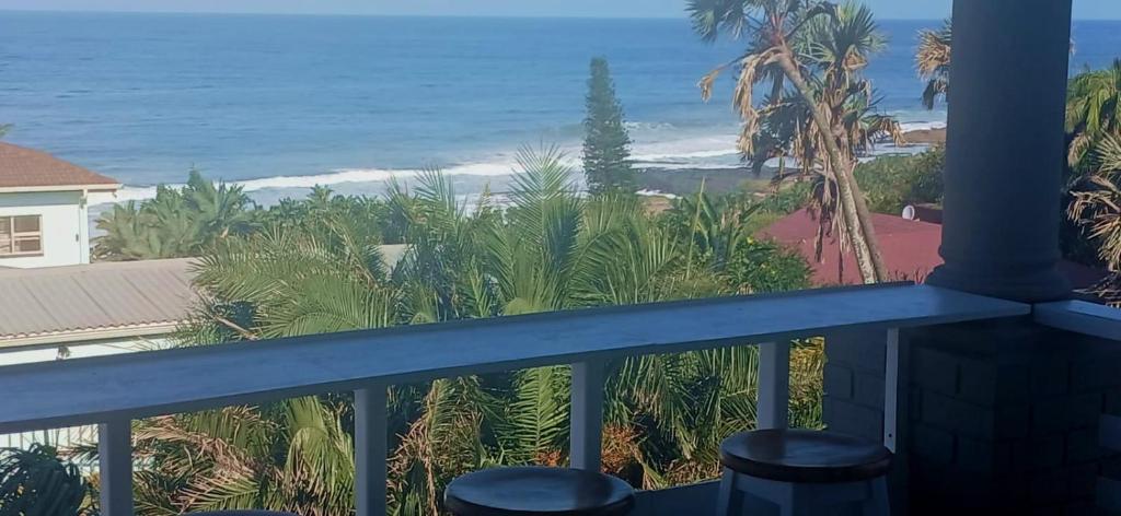 a balcony with a view of the ocean at Beach On High in Ramsgate