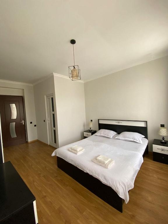 Postel nebo postele na pokoji v ubytování Guest-House Mimino