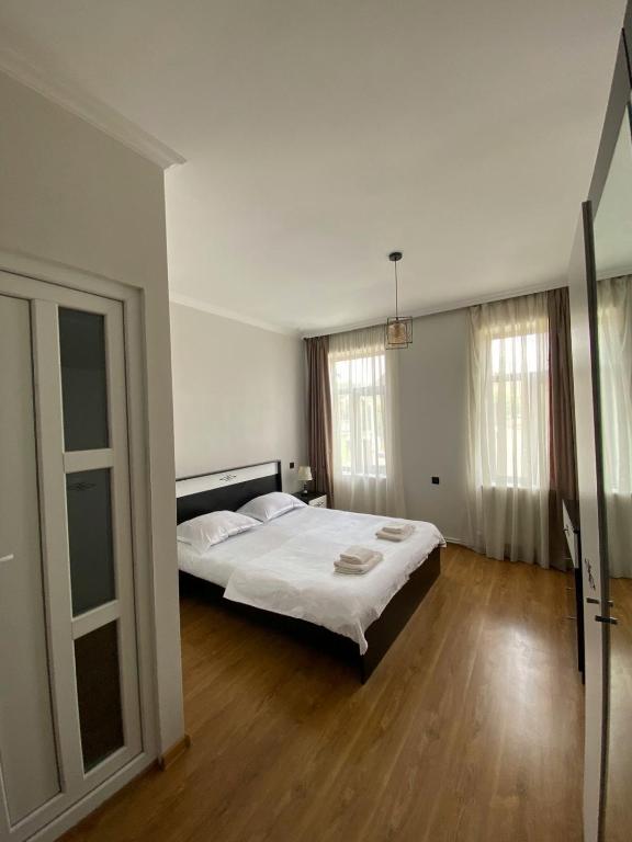 Postel nebo postele na pokoji v ubytování Guest-House Mimino