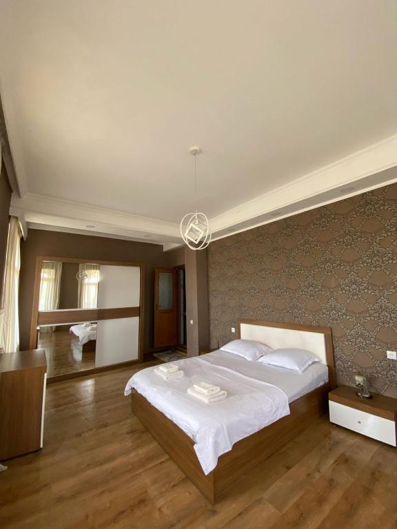 Postel nebo postele na pokoji v ubytování Guest-House Mimino