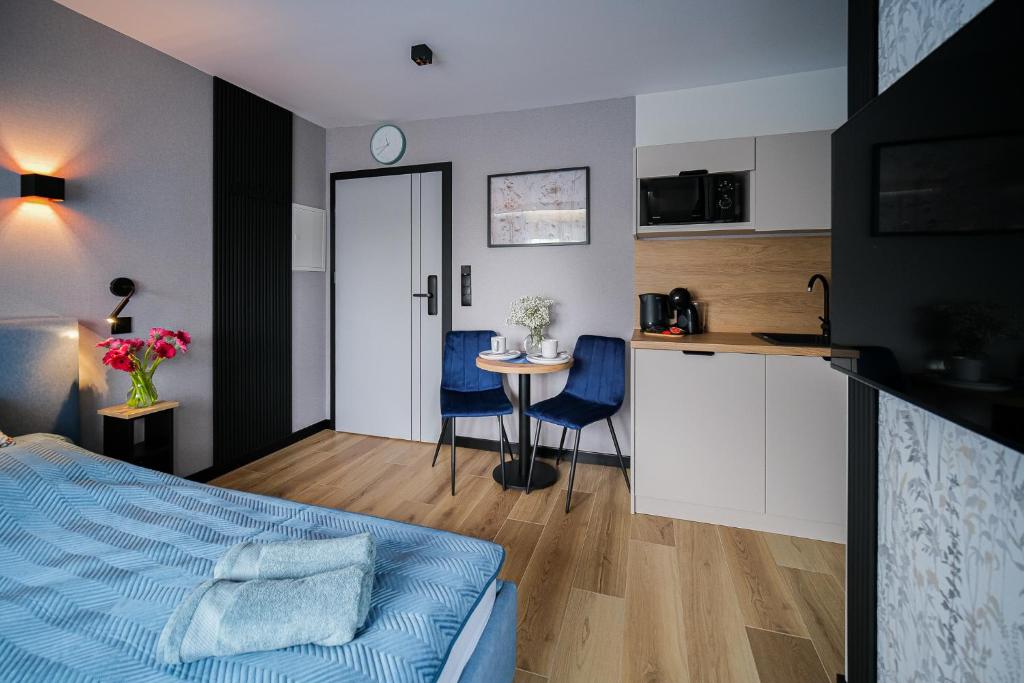 Kuchnia lub aneks kuchenny w obiekcie Apartamenty i Pokoje Złotobrzeg