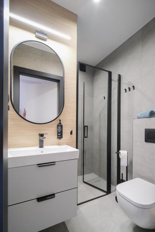 Łazienka w obiekcie Apartamenty i Pokoje Złotobrzeg