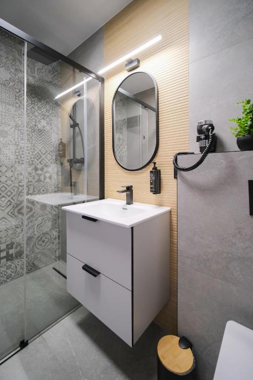 Łazienka w obiekcie Apartamenty i Pokoje Złotobrzeg