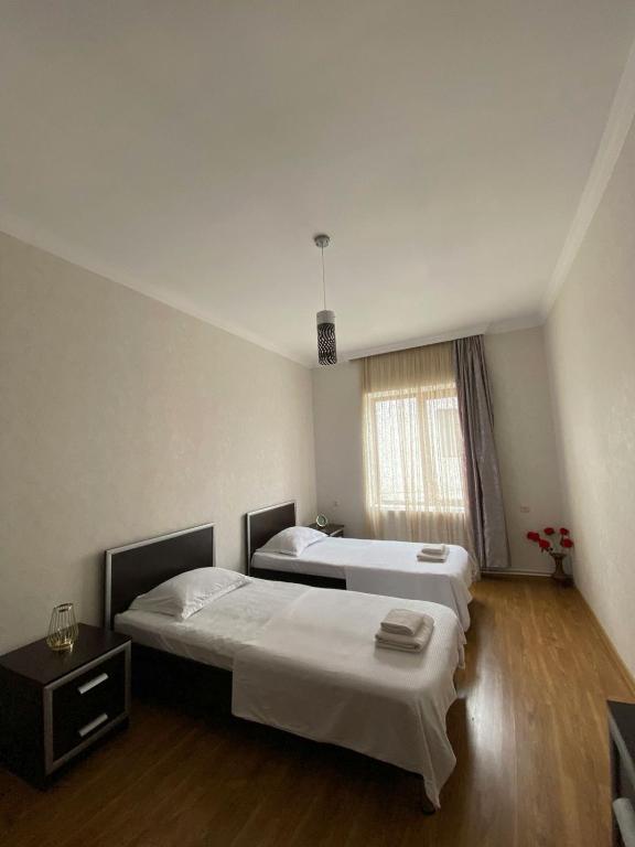Postel nebo postele na pokoji v ubytování Guest-House Mimino