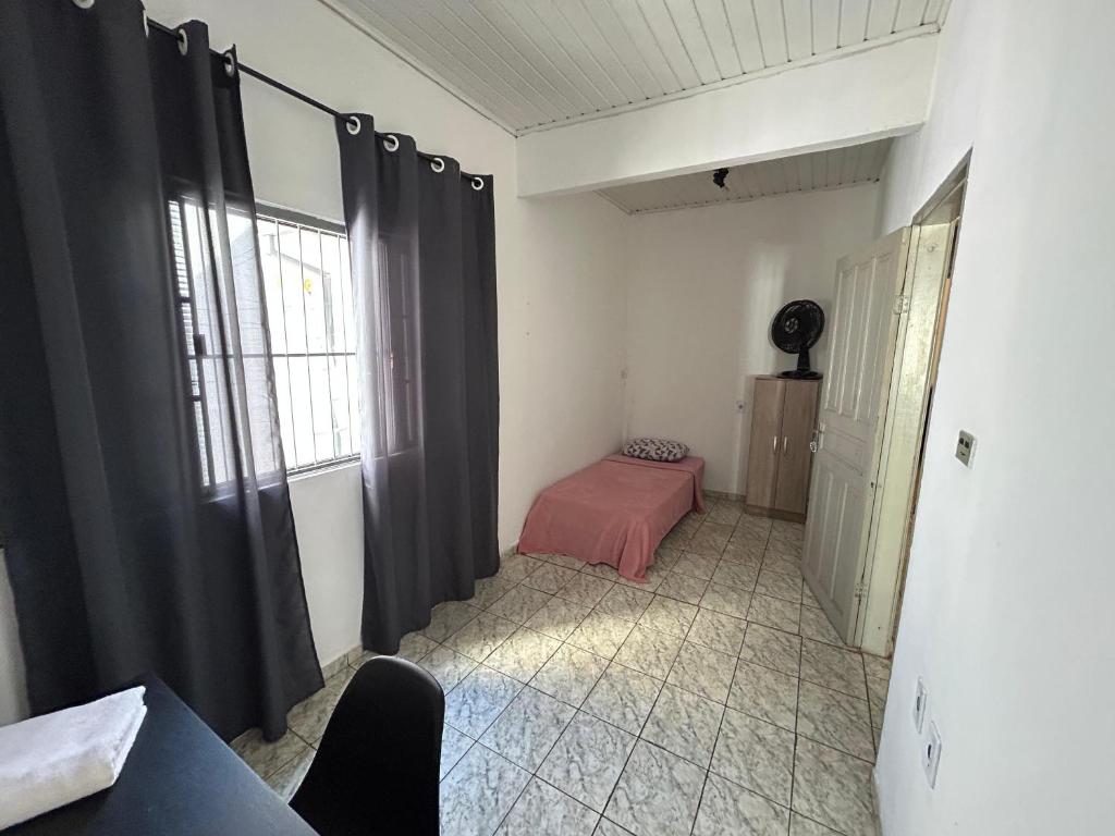Postel nebo postele na pokoji v ubytování Quarto individual