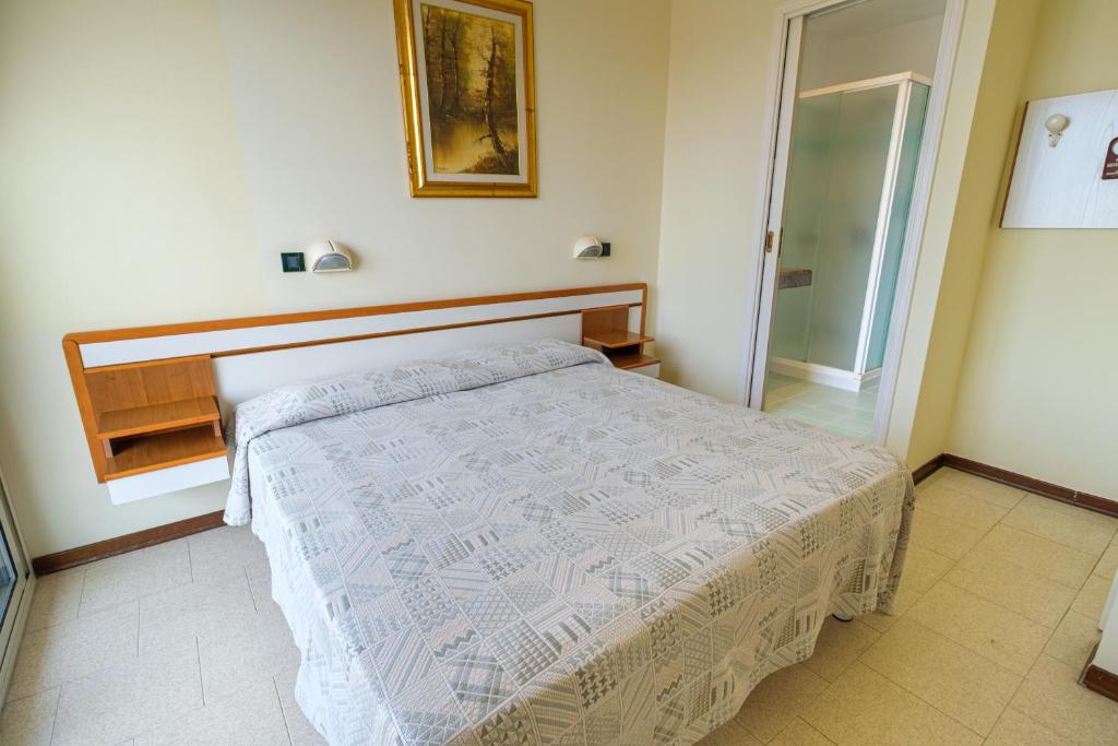 Postel nebo postele na pokoji v ubytování Hotel Classic - Azzurro Club