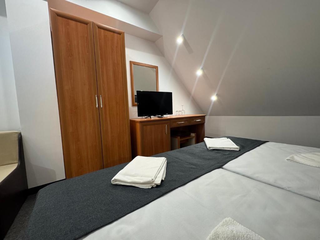 Postel nebo postele na pokoji v ubytování Adeti Residence