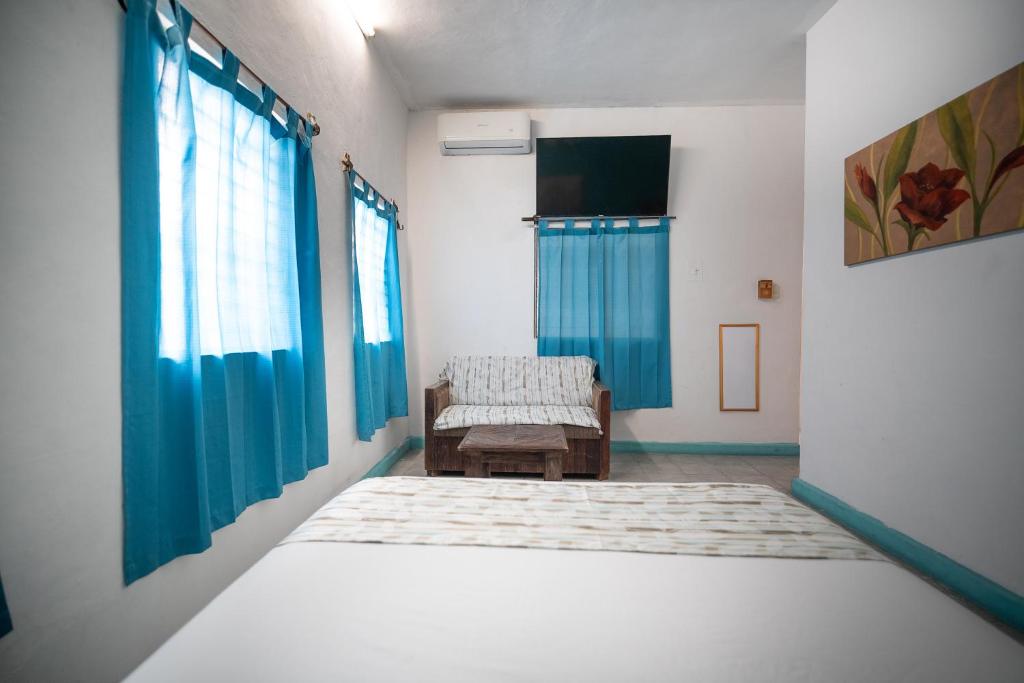 TV a/nebo společenská místnost v ubytování Hotel Posada Aurora