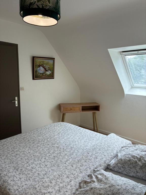 Postel nebo postele na pokoji v ubytování Gîte Maez 4 pers 29450 sizun