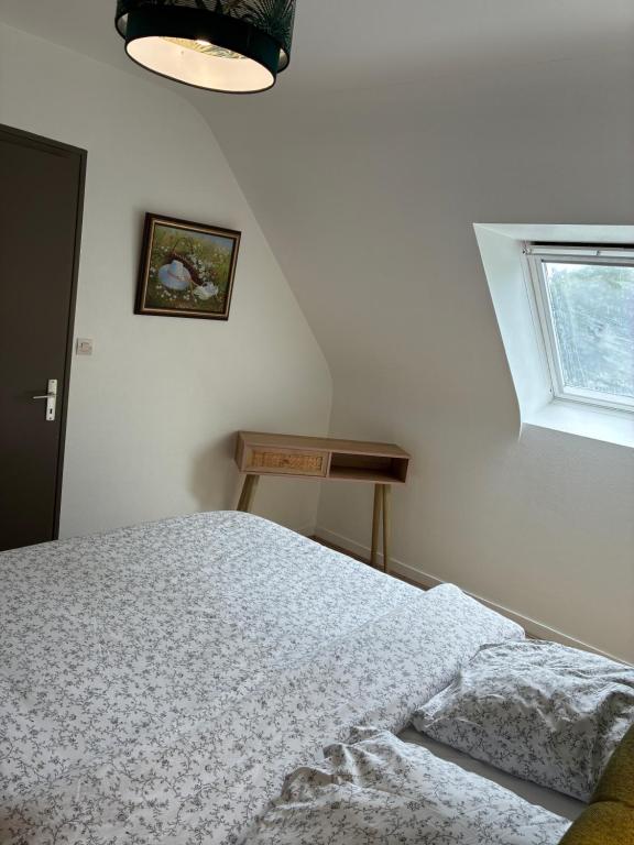 Postel nebo postele na pokoji v ubytování Gîte Maez 4 pers 29450 sizun