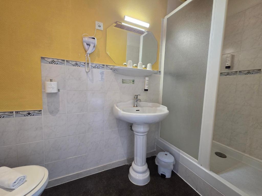 Koupelna v ubytování Hotel Magdeleine