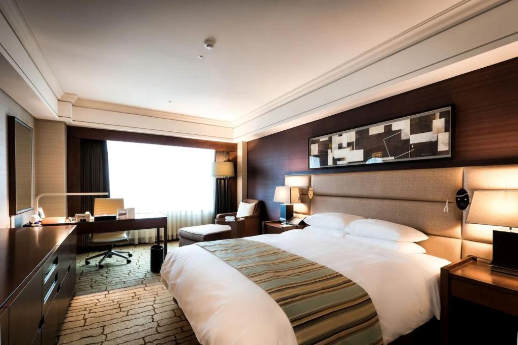 Postel nebo postele na pokoji v ubytování Hotel Loft Near IGI Airport Delhi