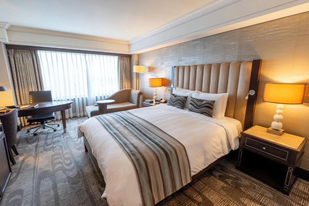 Postel nebo postele na pokoji v ubytování Hotel Loft Near IGI Airport Delhi
