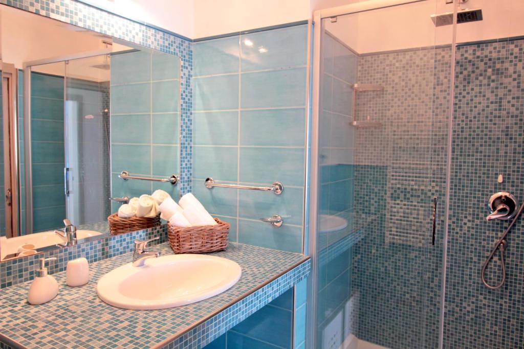 Ванная комната в Taonasi Mazzarò Apartments