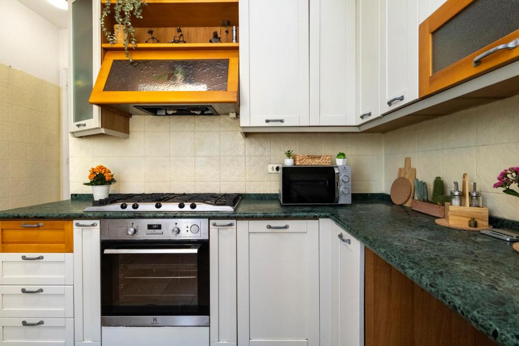 Kuchyň nebo kuchyňský kout v ubytování casa a colori