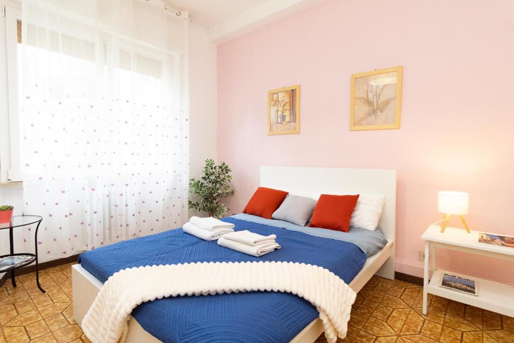 Postel nebo postele na pokoji v ubytování casa a colori
