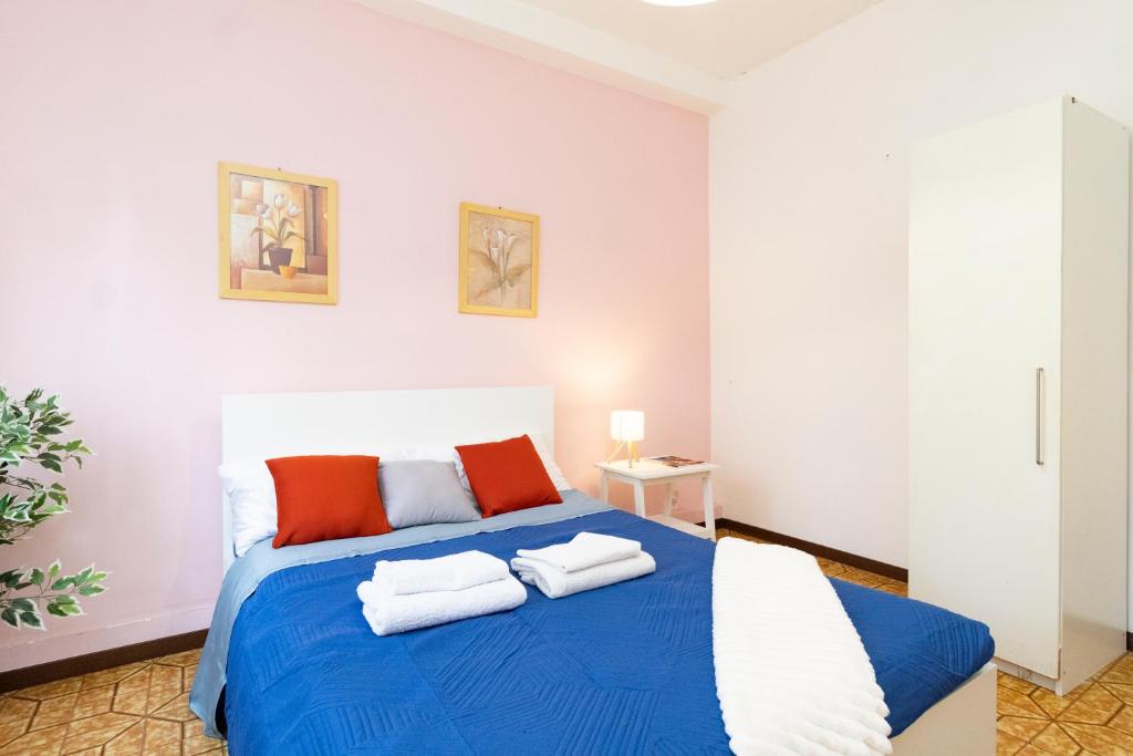 Postel nebo postele na pokoji v ubytování casa a colori