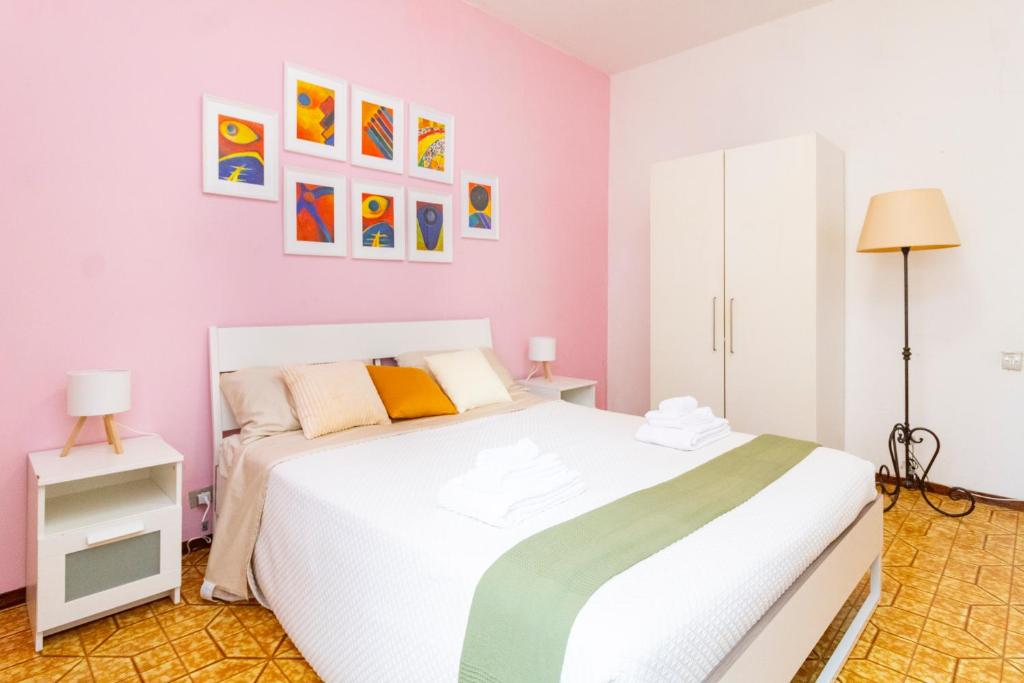 Postel nebo postele na pokoji v ubytování casa a colori