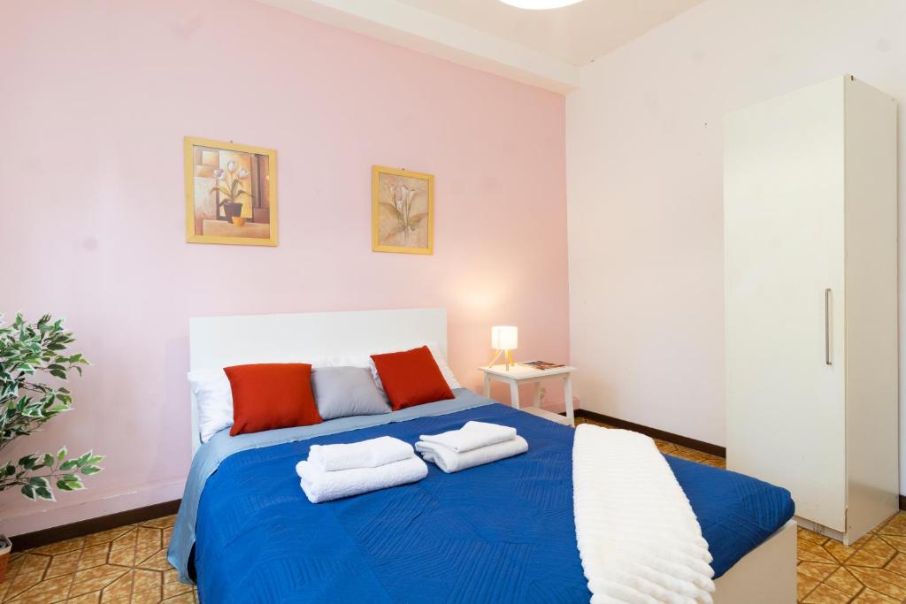 Postel nebo postele na pokoji v ubytování casa a colori