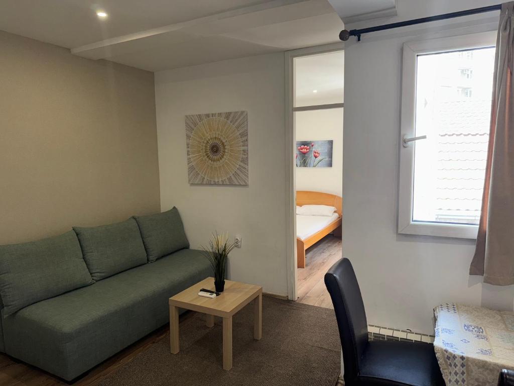 Posezení v ubytování Apartments and Rooms L E F T RIVER Belgrade