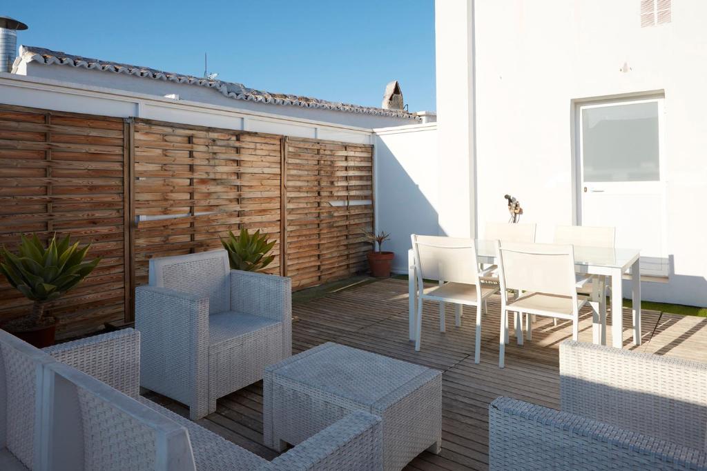 A seating area at Apartamentos La Bola Suite