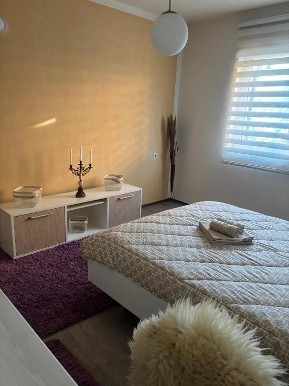Postel nebo postele na pokoji v ubytování Apartmani Keka