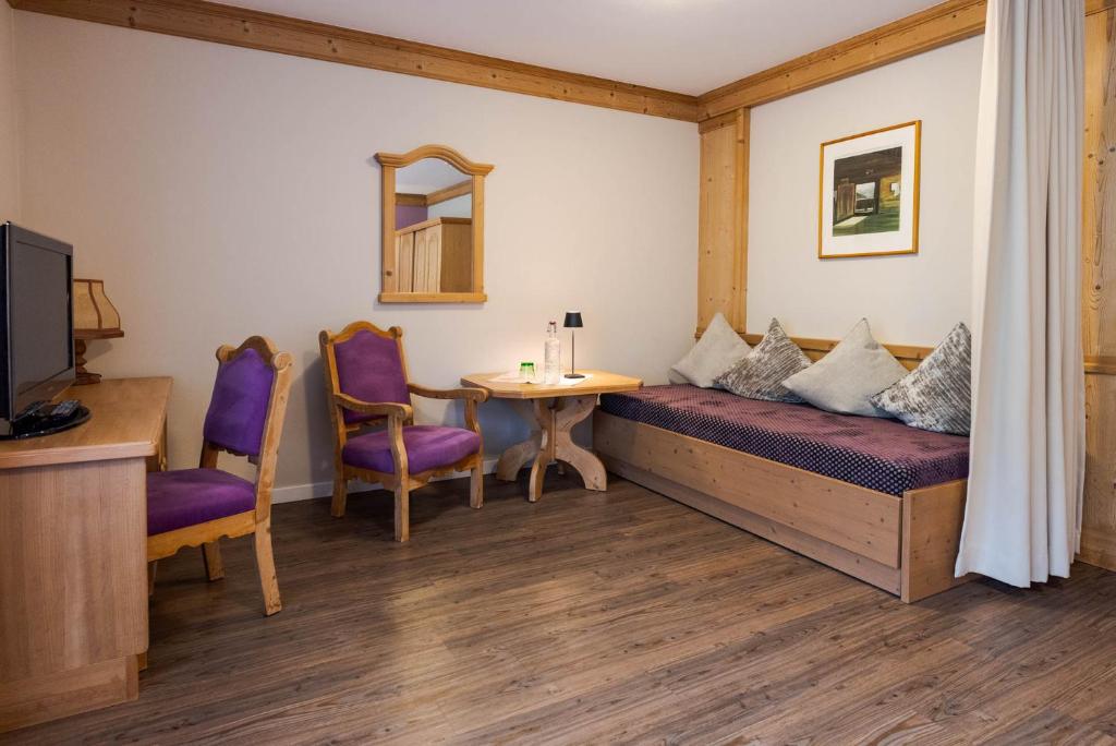 TV a/nebo společenská místnost v ubytování Familienhotel Lengauer Hof