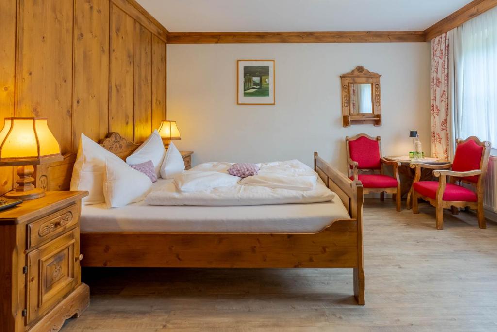 Postel nebo postele na pokoji v ubytování Familienhotel Lengauer Hof