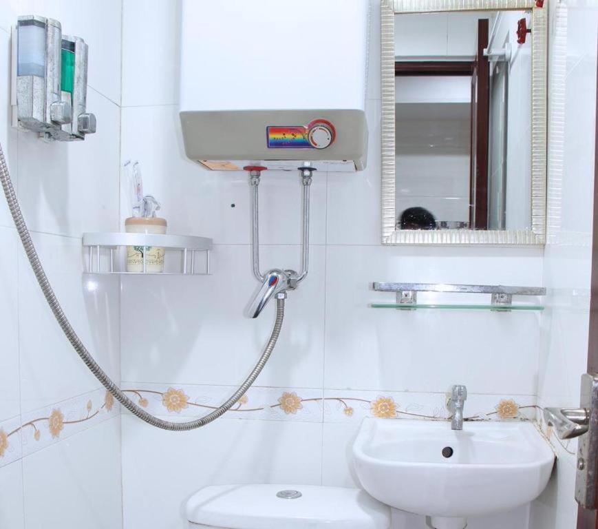Koupelna v ubytování Pay-Less Guesthouse (7/F A9)