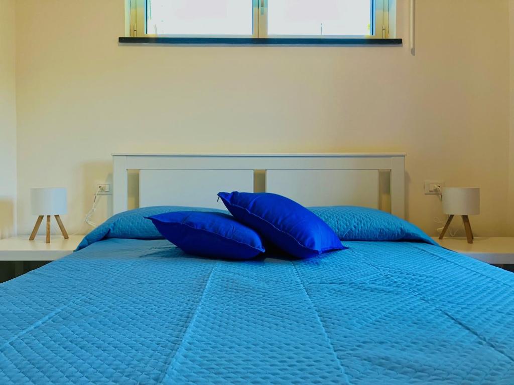 Postel nebo postele na pokoji v ubytování A due passi da Sansone