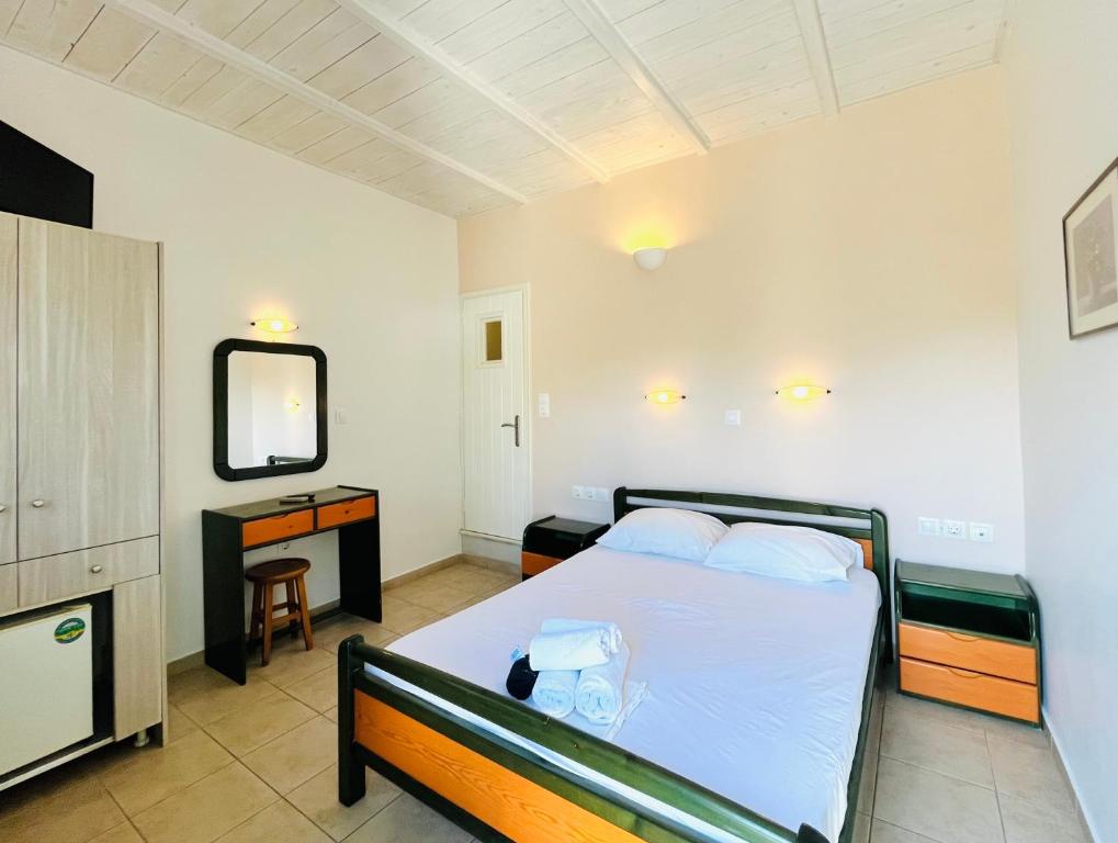 Postel nebo postele na pokoji v ubytování Galaxy Hotel