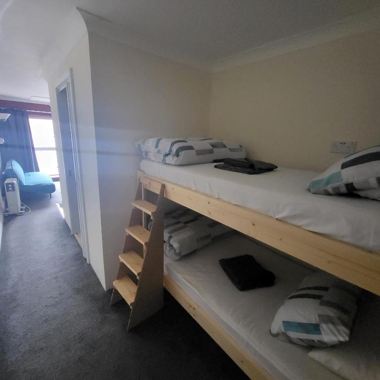 Postel nebo postele na pokoji v ubytování Ossians