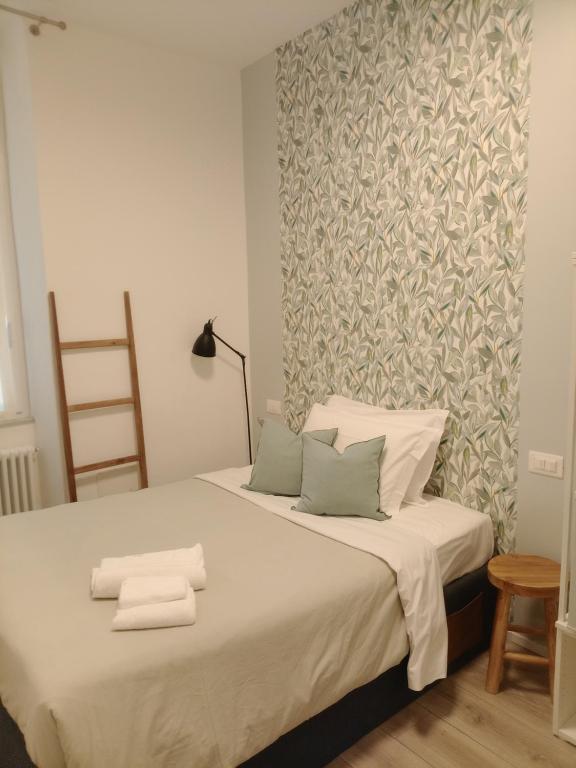 Postel nebo postele na pokoji v ubytování Rooms La Spezia 5 Terre
