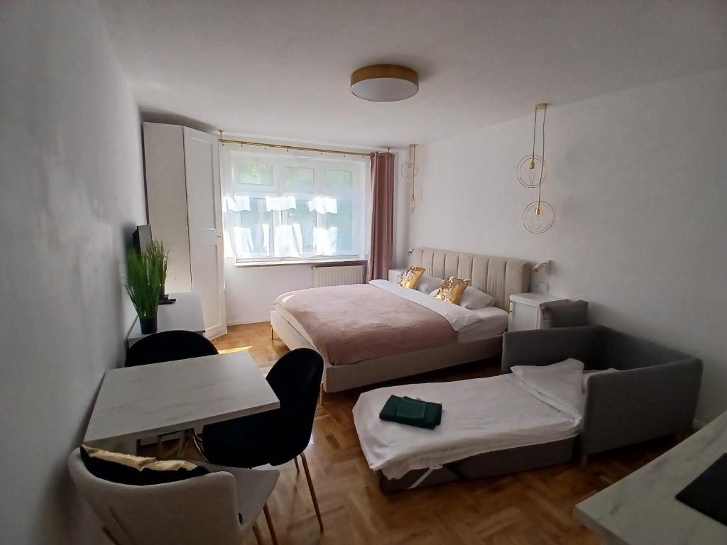 Posteľ alebo postele v izbe v ubytovaní La Alaia Apartment with parking
