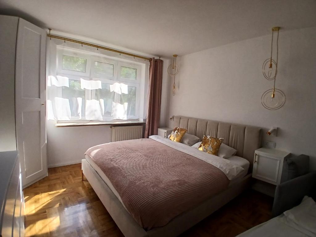 Posteľ alebo postele v izbe v ubytovaní La Alaia Apartment with parking