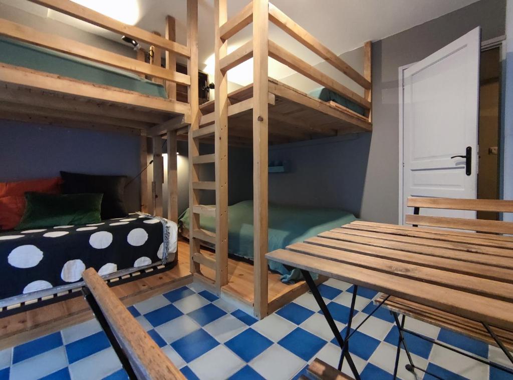 Posteľ alebo postele v izbe v ubytovaní La cachette maison de ville