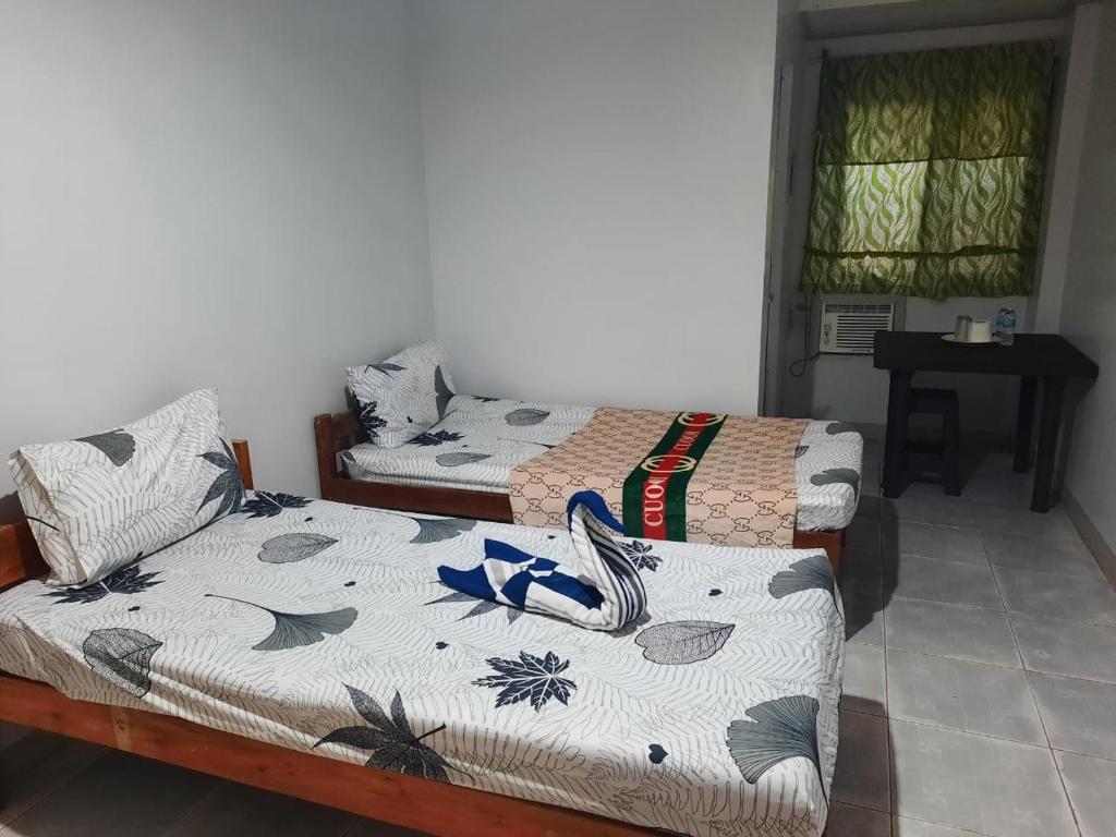 Postel nebo postele na pokoji v ubytování ZM Residence