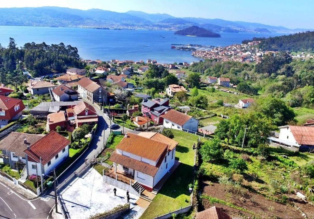 an aerial view of a small town next to the water at Casalvito in Rial