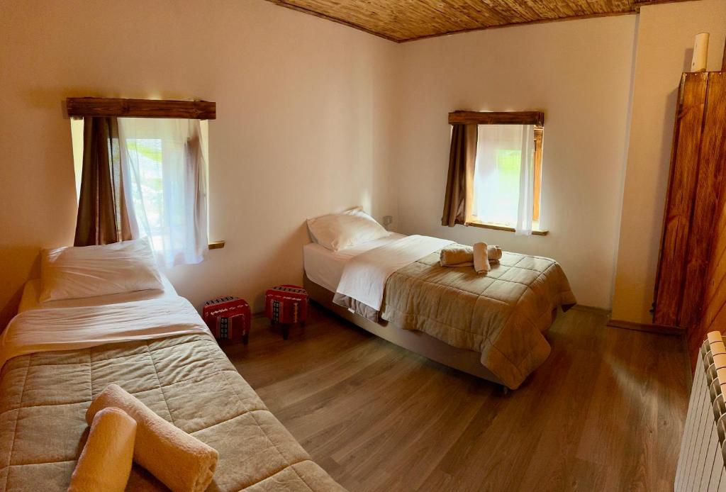 Postel nebo postele na pokoji v ubytování Guesthouse Prrockaj Theth