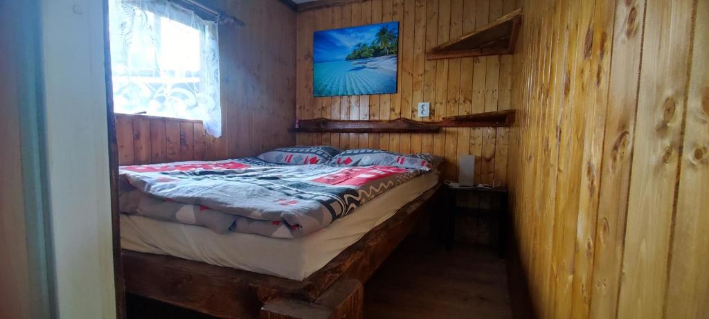 Postel nebo postele na pokoji v ubytování Pronájem dřevěného mobilheimu Štít