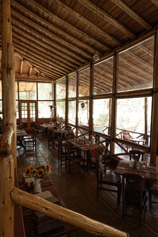 Restaurace v ubytování QASA Valle Sagrado by Nomad